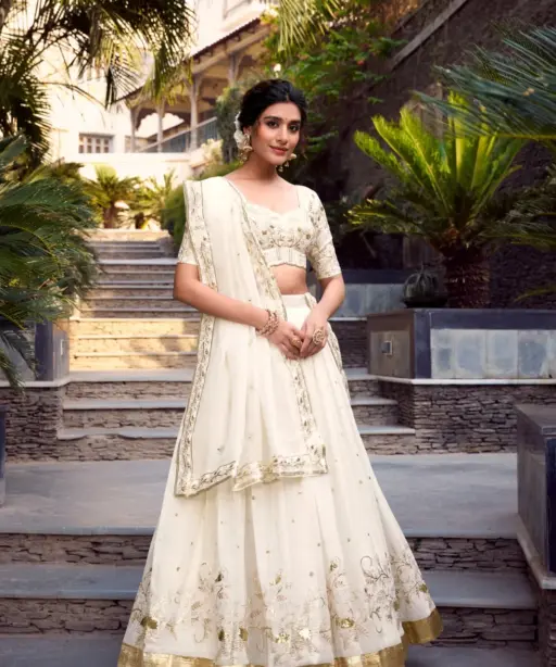 Off-White Lehenga Choli with Golden Embroidery work