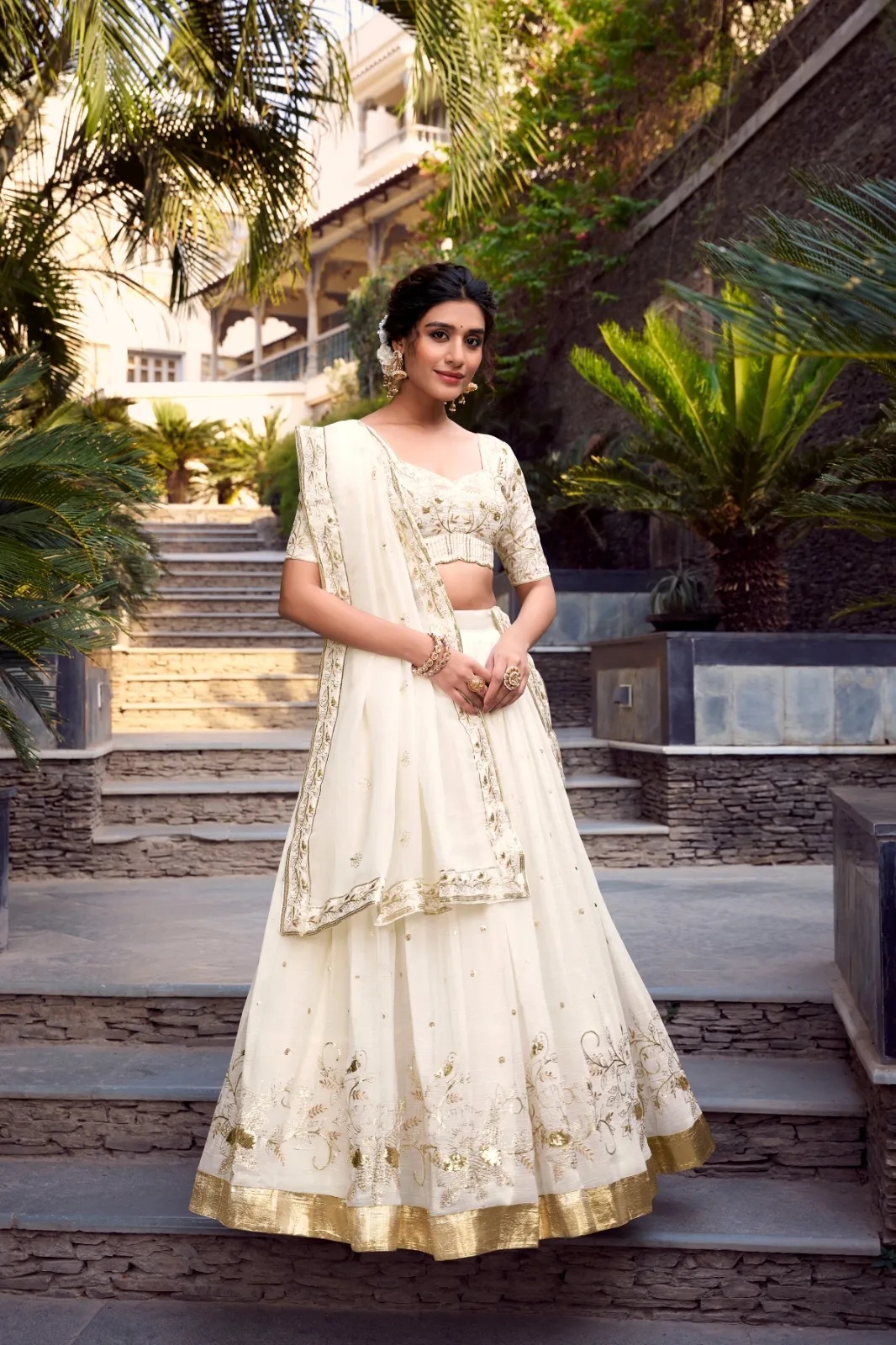 Off-White Lehenga Choli with Golden Embroidery work