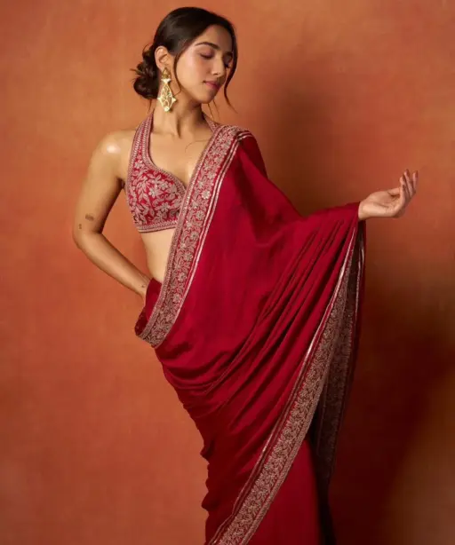Ahsaas Channa wearing a red saree