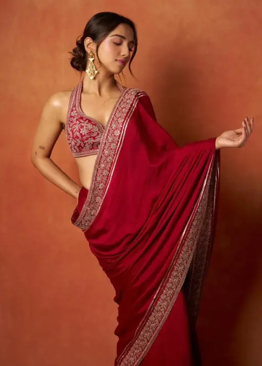 Ahsaas Channa wearing a red saree
